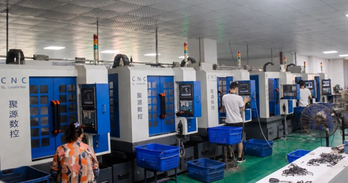 CNC machining acetate eyewear frames at a Shenzhen factory