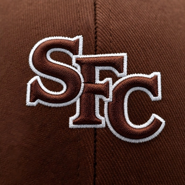 Flat SFC embroidery on brown baseball cap fabric